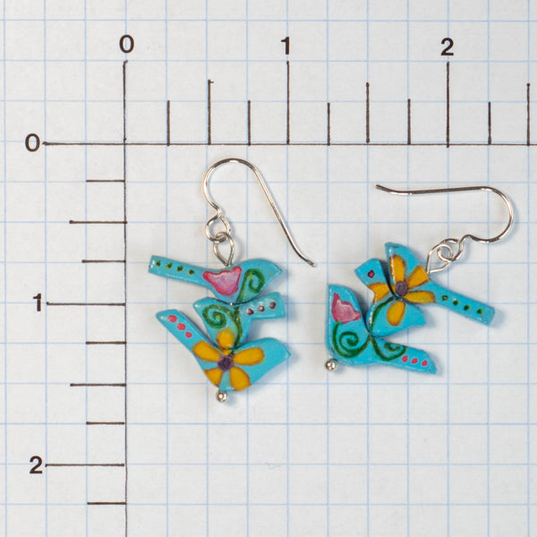 The birds in these handmade earrings wanted a new beginning, a new opportunity and a new trail to travel so they morphed out of a rulerdom and became a tribe of flower power birds.