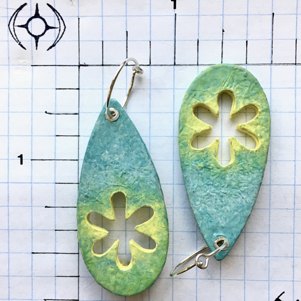 The rain has passed leaving blue skies, the smell of fresh grass and the yellow flowers have burst into bloom.  The teardrop shaped earrings have been created from wood, paper and paint.  20 gauge Argentium™ oval hoop ear wires (18mm)  Length:  2 5/8" from the top of the hoop to the bottom of the charm.  Charm:    2" long x 7/8" wide