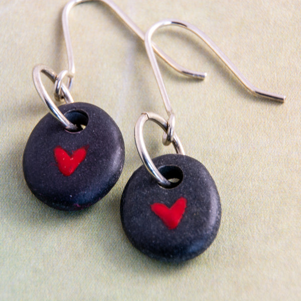 It’s always a welcome surprise when two stones that are similar enough to become earrings! This can take a lot of rock hounding and sorting but it is always worth it! This pair asked for a tiny red heart to be painted on each of them. Let them whisper their secrets of love in your ears...only for you to hear.
